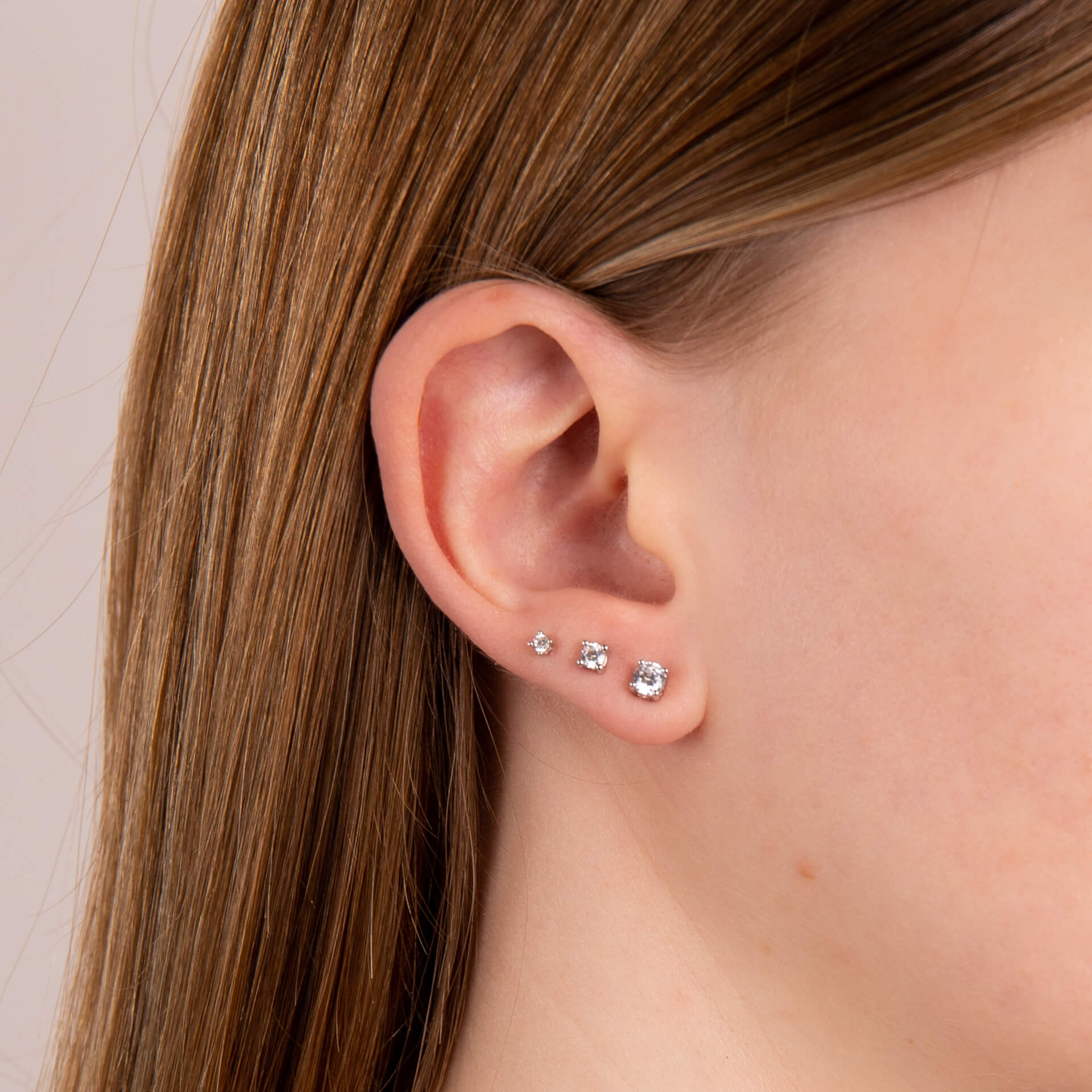 Four Claw Carat Stud Earrings